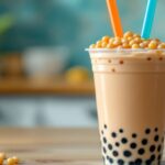 Close-up of boba milk tea with tapioca pearls.