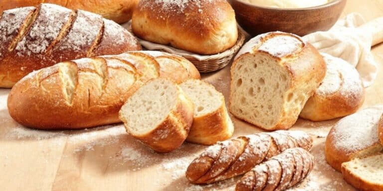 Freshly baked bread with golden crusts and soft interiors.